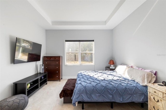 bedroom featuring a tray ceiling