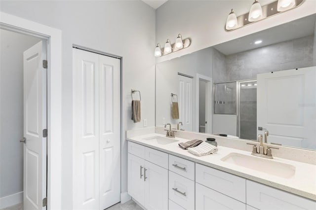 bathroom featuring vanity and walk in shower