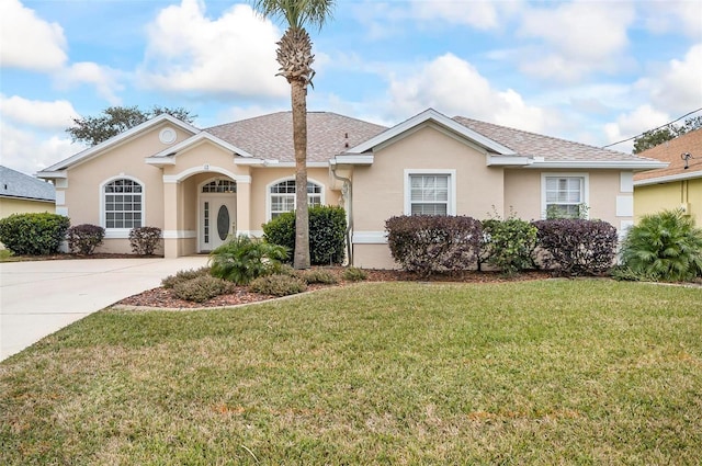 single story home with a front yard