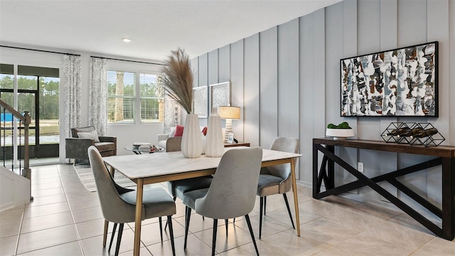 dining area with light tile patterned floors