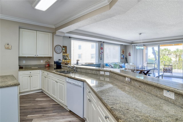 kitchen with dishwasher, white cabinetry, sink, light stone counters, and crown molding