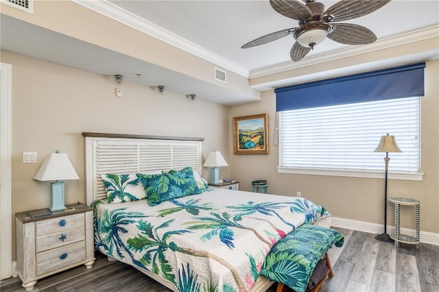 bedroom featuring ceiling fan, hardwood / wood-style flooring, and ornamental molding