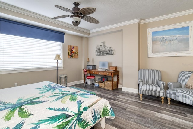 bedroom with a textured ceiling, ceiling fan, crown molding, and hardwood / wood-style floors