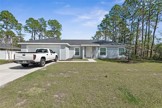 single story home featuring a garage, a front yard, concrete driveway, and stucco siding