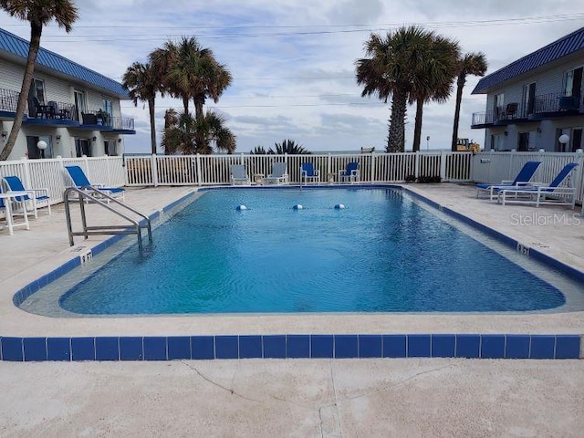 view of pool with a patio