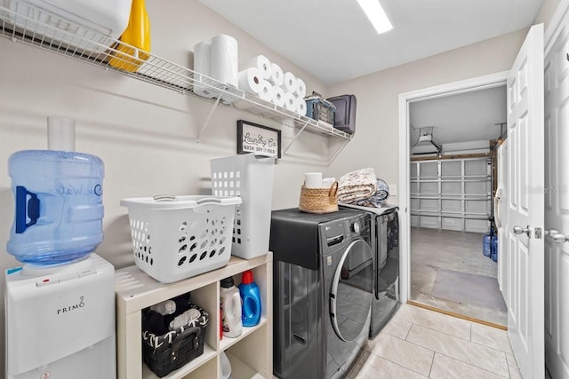 laundry room with independent washer and dryer