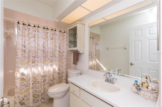 full bathroom with shower / bathtub combination with curtain, vanity, and toilet