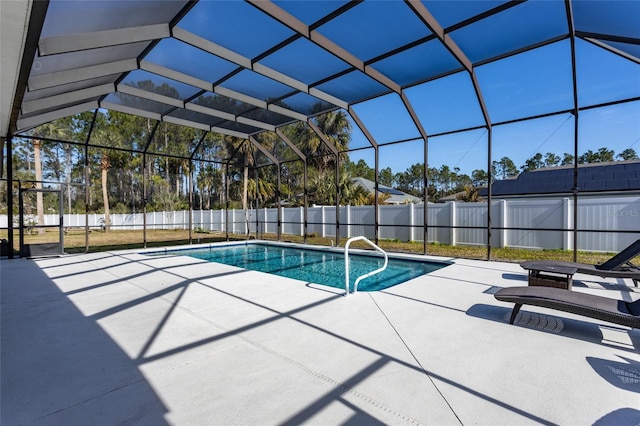 view of pool featuring a patio and a lanai