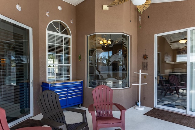 property entrance featuring ceiling fan