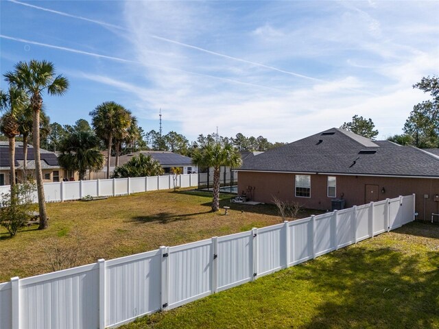 view of yard featuring central AC unit