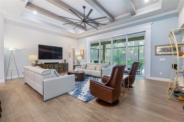 living room featuring crown molding, ceiling fan, and light wood-type flooring