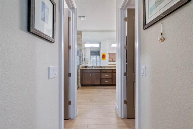 hall featuring sink