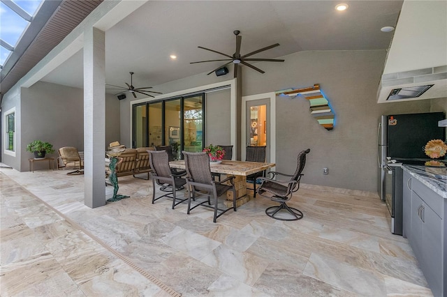 view of patio featuring ceiling fan