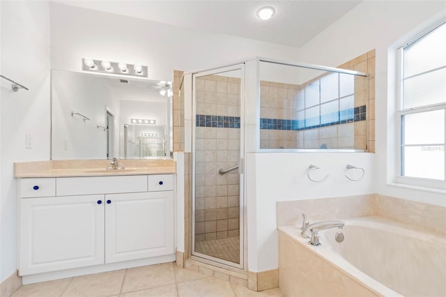 bathroom with vanity, separate shower and tub, and tile patterned floors