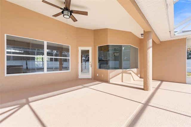 view of patio featuring ceiling fan