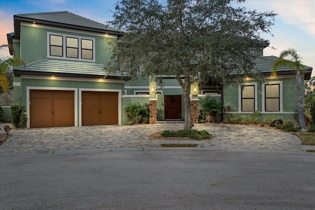 view of front of home with a garage