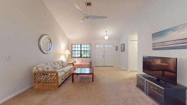 living room featuring light carpet, high vaulted ceiling, and ceiling fan