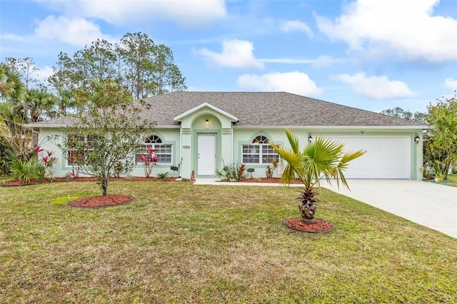 ranch-style house with a garage and a front lawn