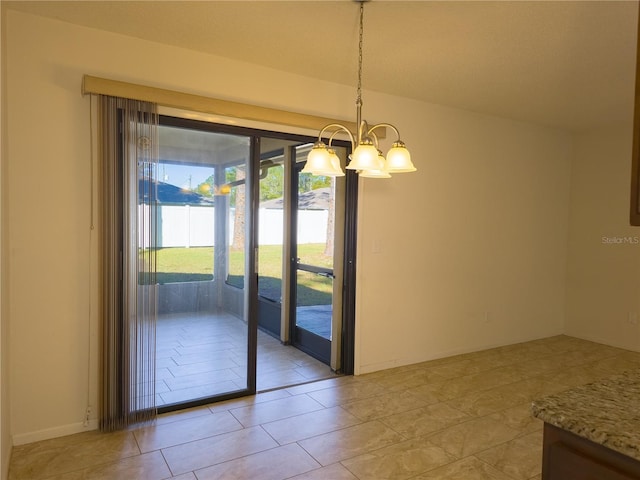 unfurnished dining area featuring light tile patterned flooring and a chandelier