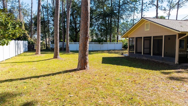 view of yard featuring a sunroom