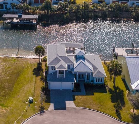 bird's eye view with a water view