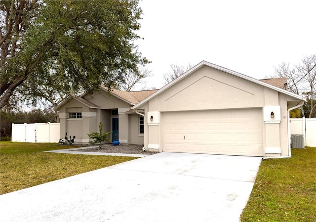 ranch-style house with a garage, central AC, and a front lawn