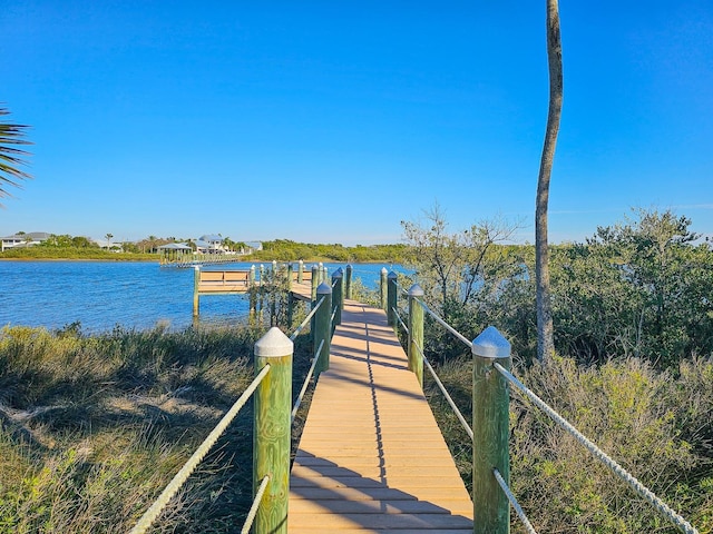 view of dock with a water view