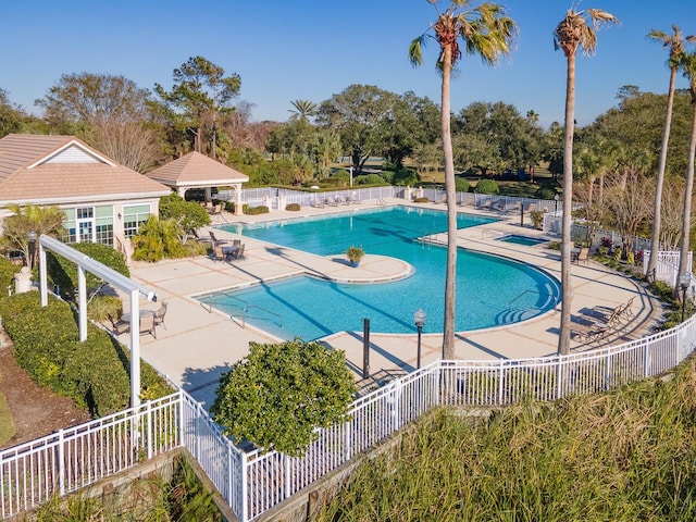 view of pool with a gazebo and a patio