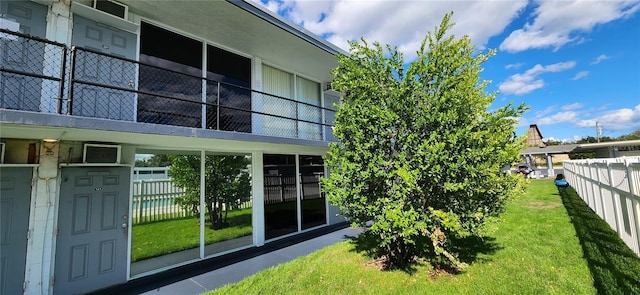 exterior space with a lawn