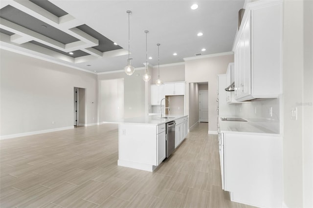 kitchen with open floor plan, light countertops, stainless steel dishwasher, and a sink