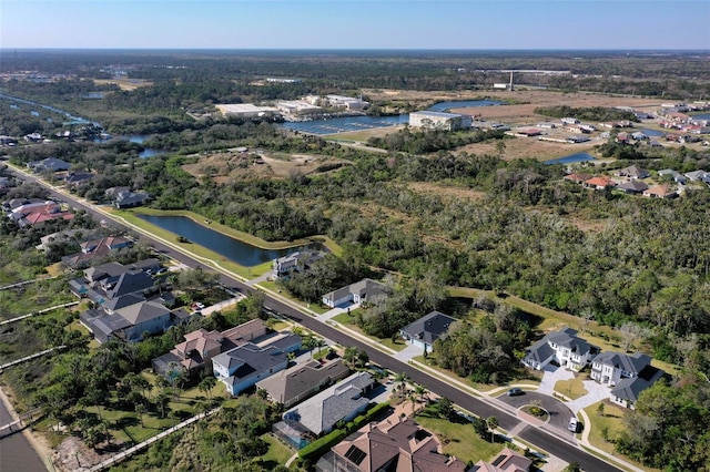 aerial view featuring a water view and a residential view