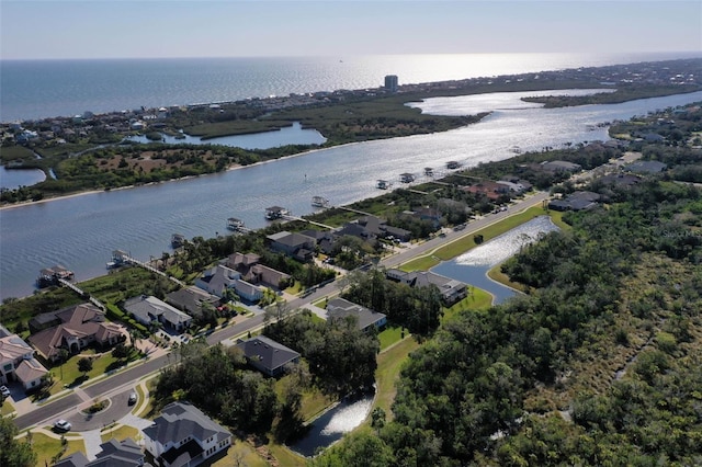 bird's eye view with a water view and a residential view