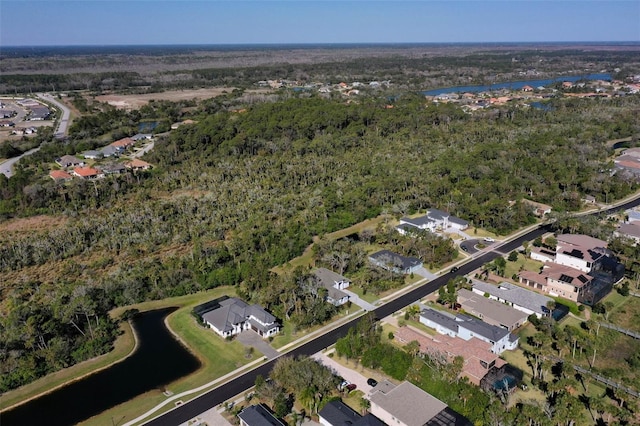 bird's eye view with a residential view and a view of trees