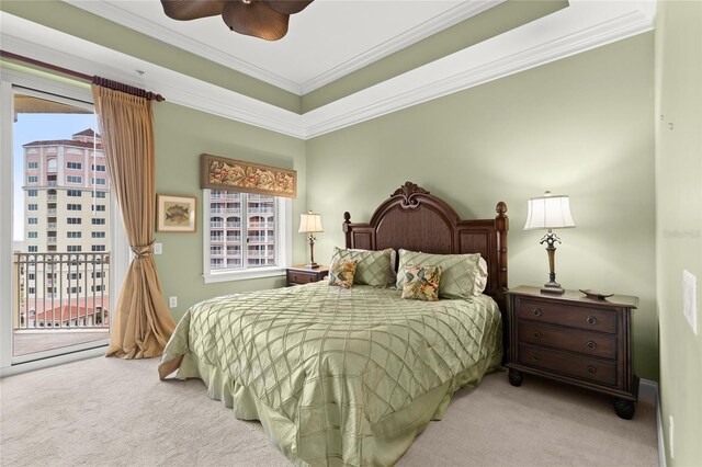 bedroom with access to exterior, carpet, multiple windows, and crown molding