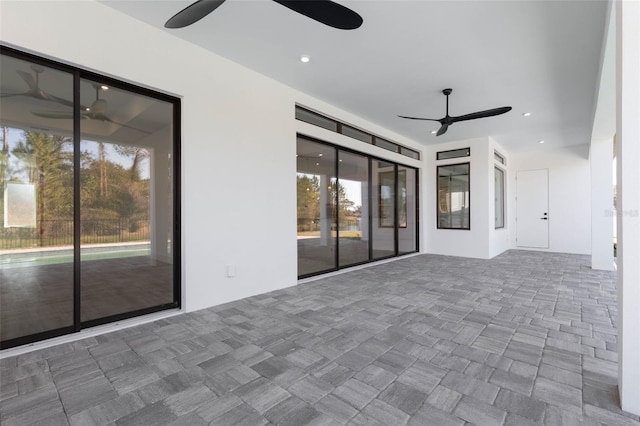 view of patio / terrace featuring ceiling fan