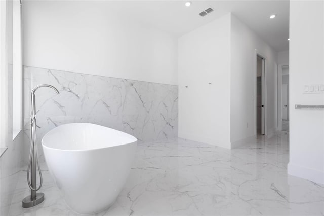 bathroom featuring a bathing tub