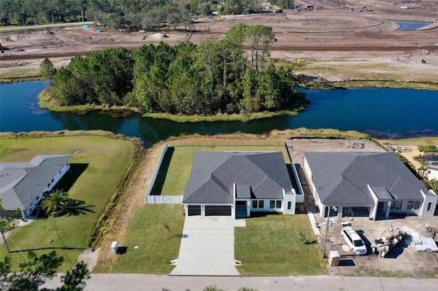 drone / aerial view with a water view