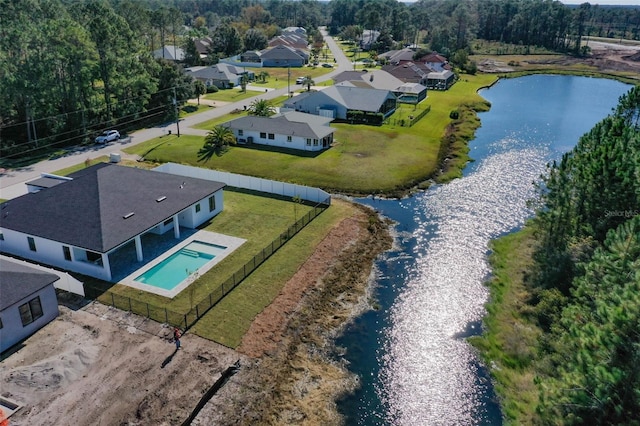 drone / aerial view with a water view