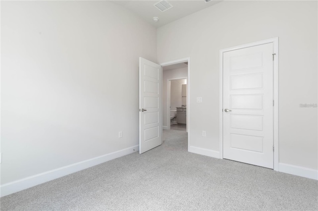 unfurnished bedroom featuring carpet