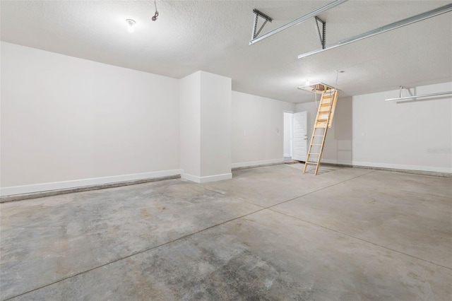 48 Bannbury Ln, Palm Coast, FL 32137 - garage featuring baseboards