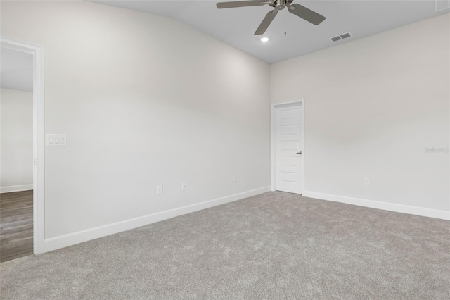 48 Bannbury Ln, Palm Coast, FL 32137 - carpeted spare room with a ceiling fan, baseboards, vaulted ceiling, and recessed lighting