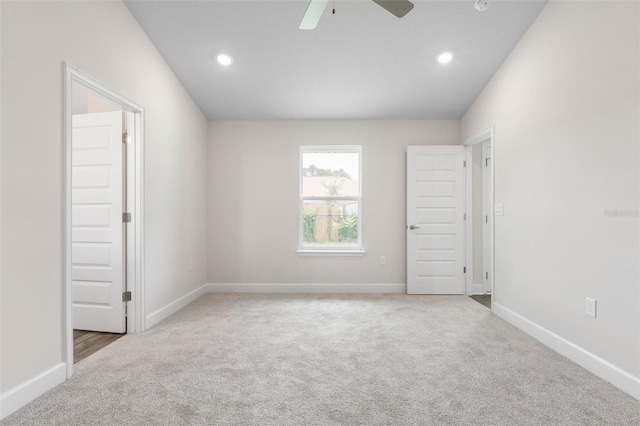 48 Bannbury Ln, Palm Coast, FL 32137 - spare room with carpet floors, baseboards, a ceiling fan, and recessed lighting