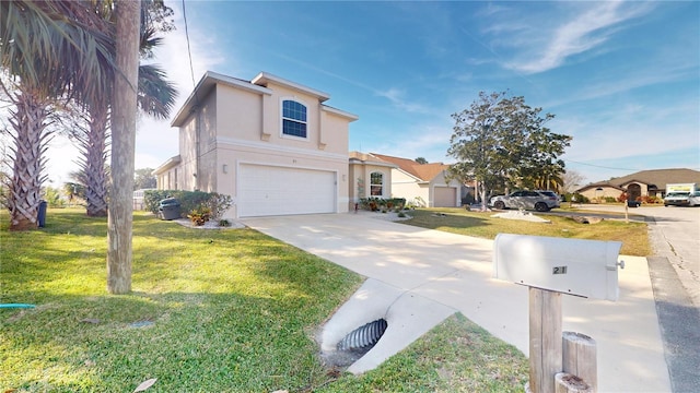 view of property with a garage and a front yard