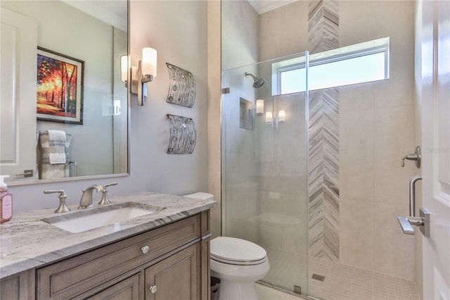 bathroom featuring walk in shower, vanity, toilet, and crown molding