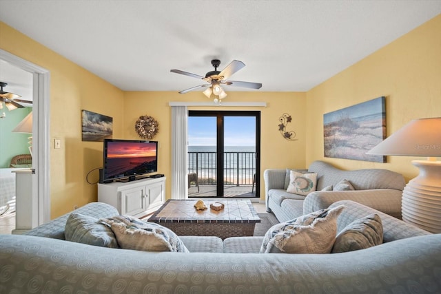 living room featuring ceiling fan