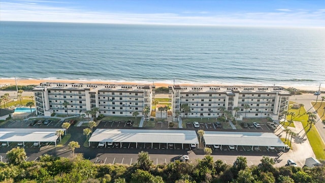 aerial view featuring a beach view and a water view