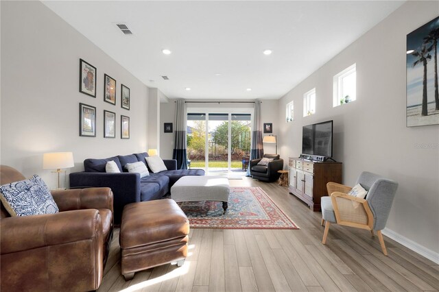 living room featuring light wood-type flooring