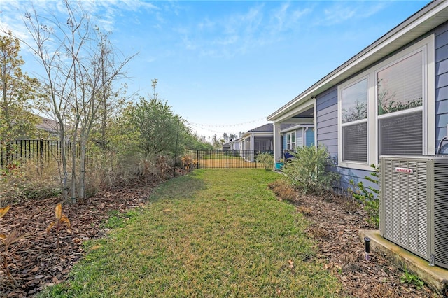 view of yard with central AC