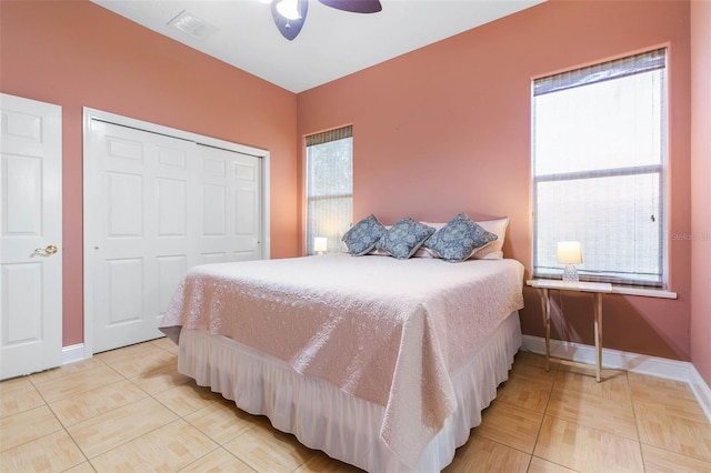 bedroom featuring a closet and ceiling fan