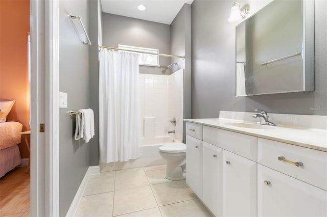 full bathroom featuring shower / tub combo with curtain, vanity, toilet, and tile patterned flooring